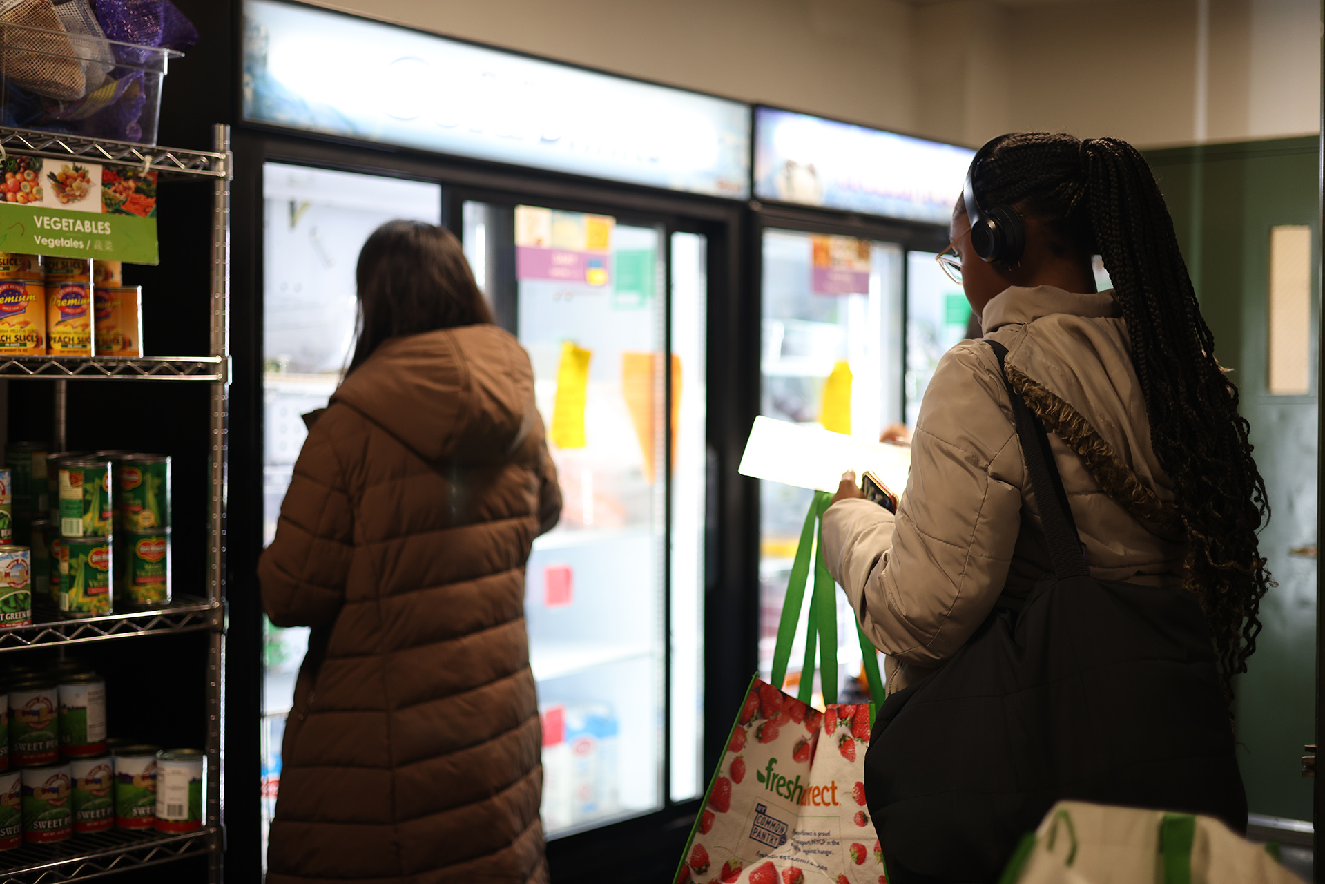 Two women in a food pantry