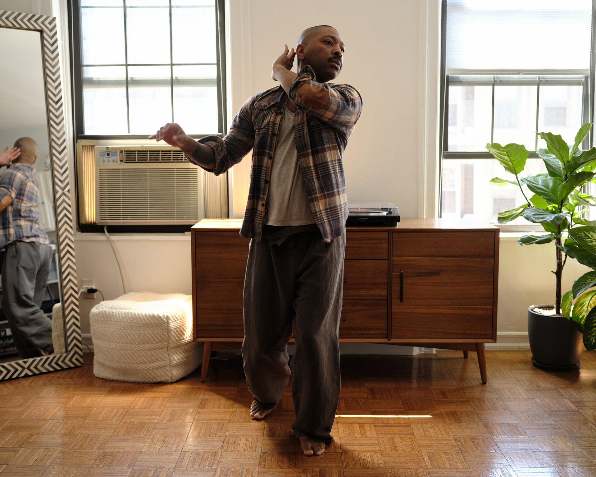 Kyle Abraham '06 in his Brooklyn apartment, courtesy of the New York Times