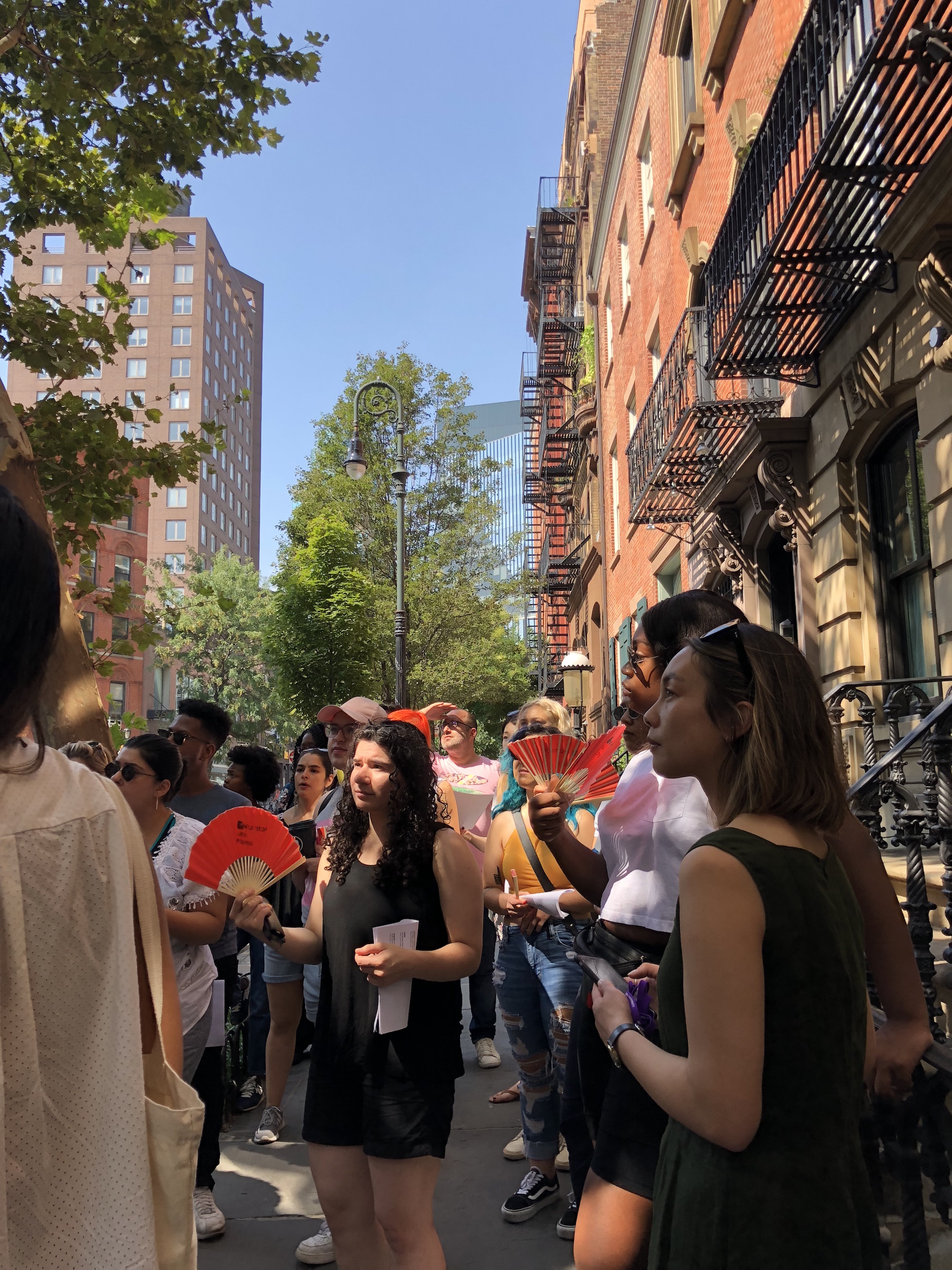 Art & Public Policy students listen to a guided tour of the local area given by Prof. Pato Hebert