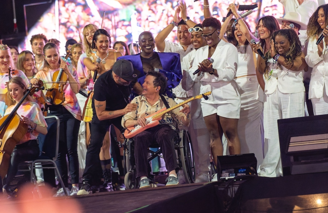 Jeff Peretz alongside Michael J Fox onstage at Glastonbury