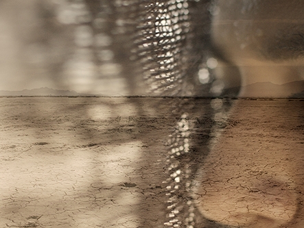 Film still from The Unholy War. Image of woman with head dress overlayed onto image of the desert.