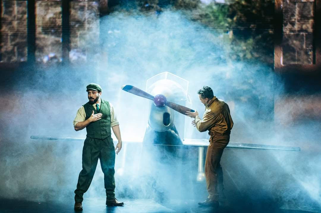 The Little Prince promo photo- two men and plane