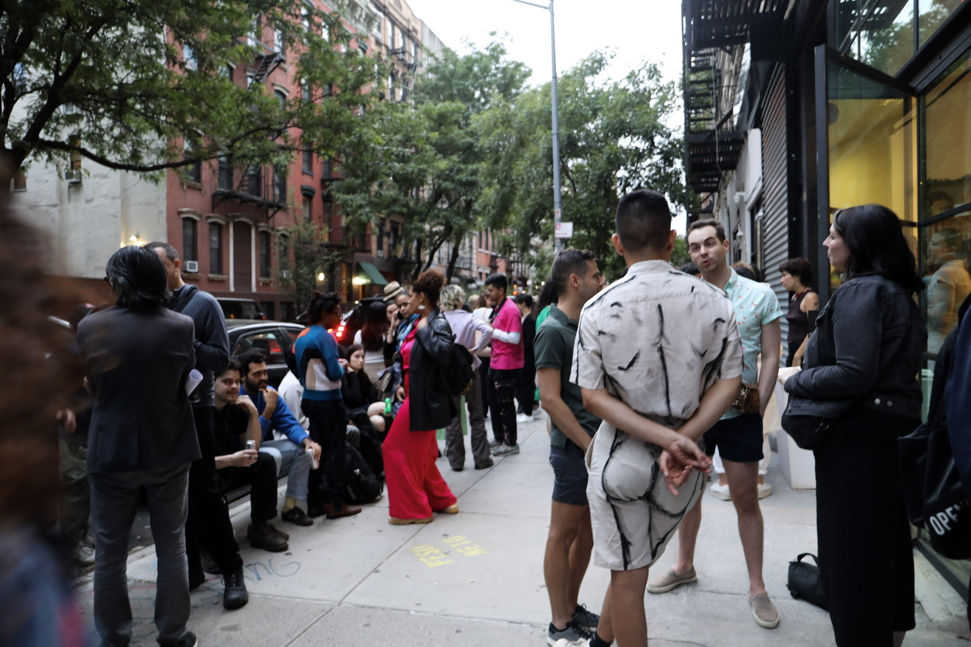 People gathered outside the gallery