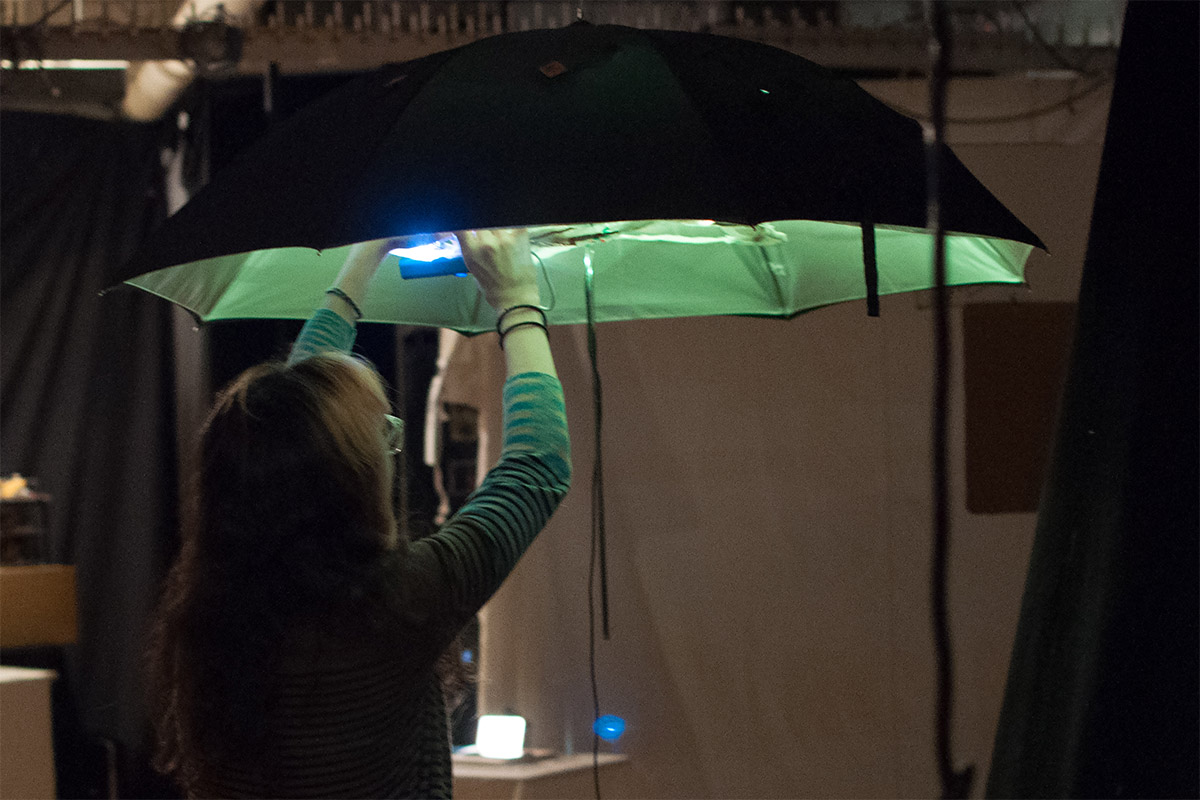 an open umbrella with a light inside