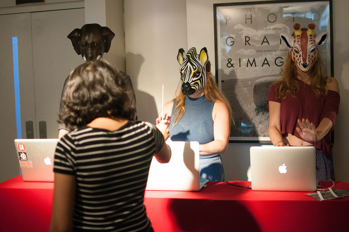 students wearing animal masks