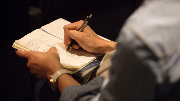 notebook and hands