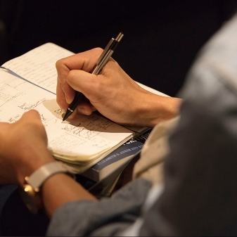 notebook and hands