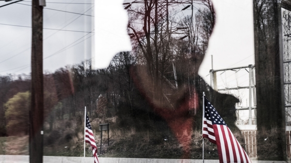 Woman's reflection in a window