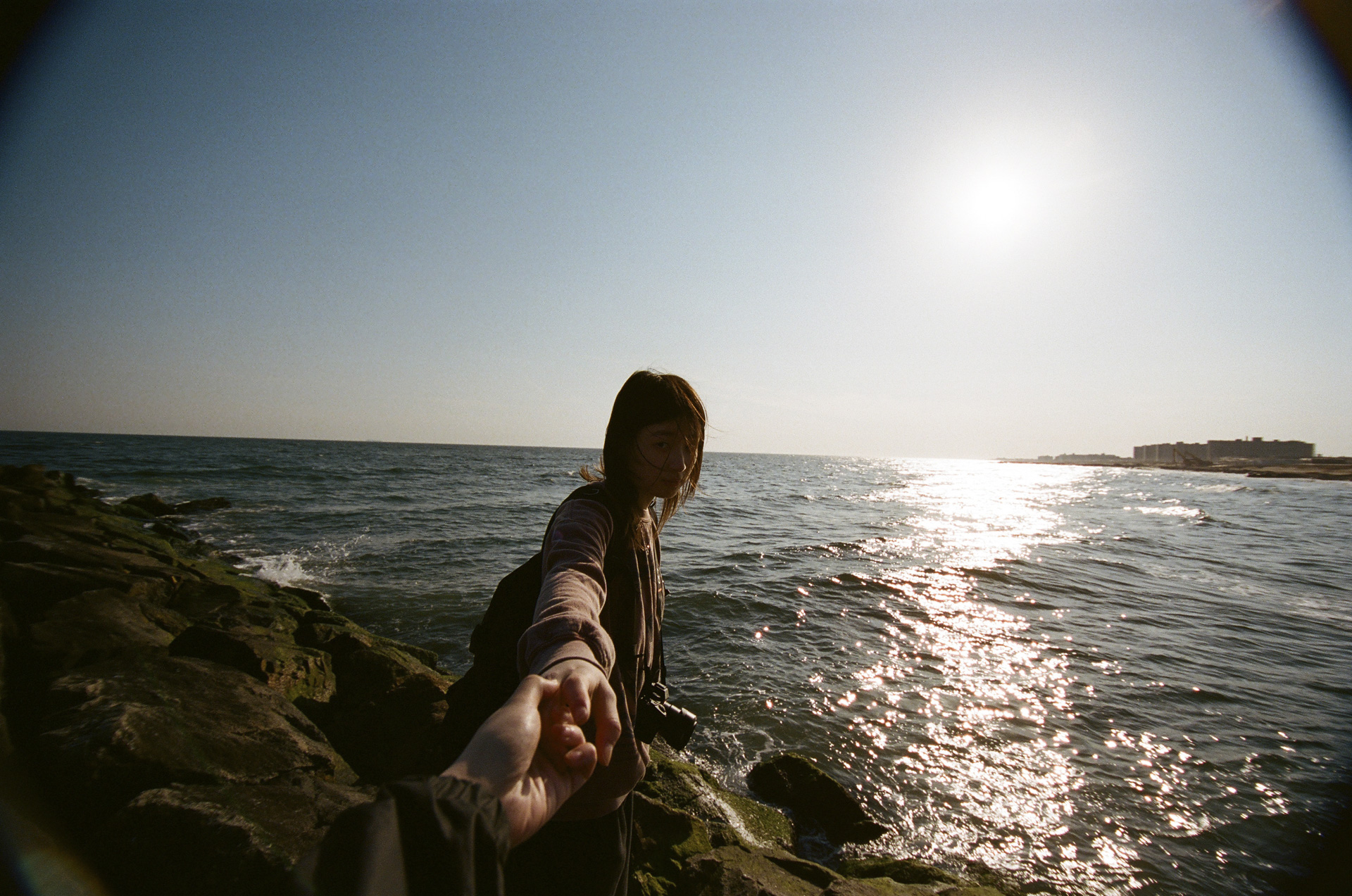 exterior portrait of a person on a waterfront