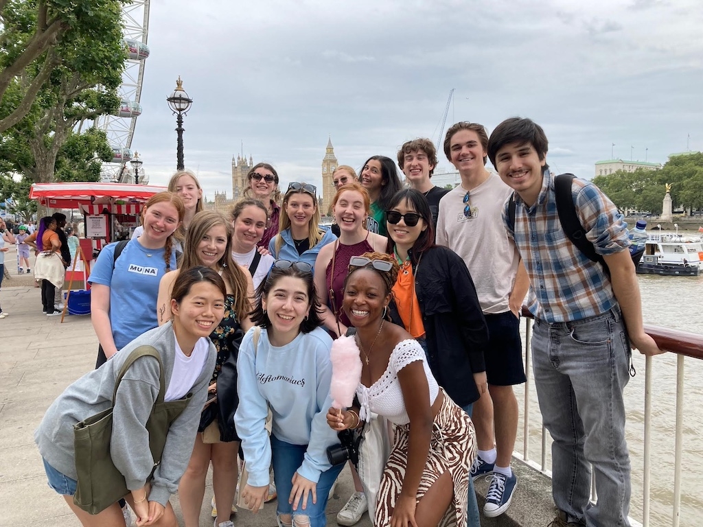 Photo of the summer 2023 Producing in London class smiling and posing for a group photo outdoors in London.