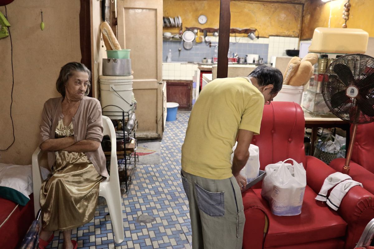 Cubans inside their home.